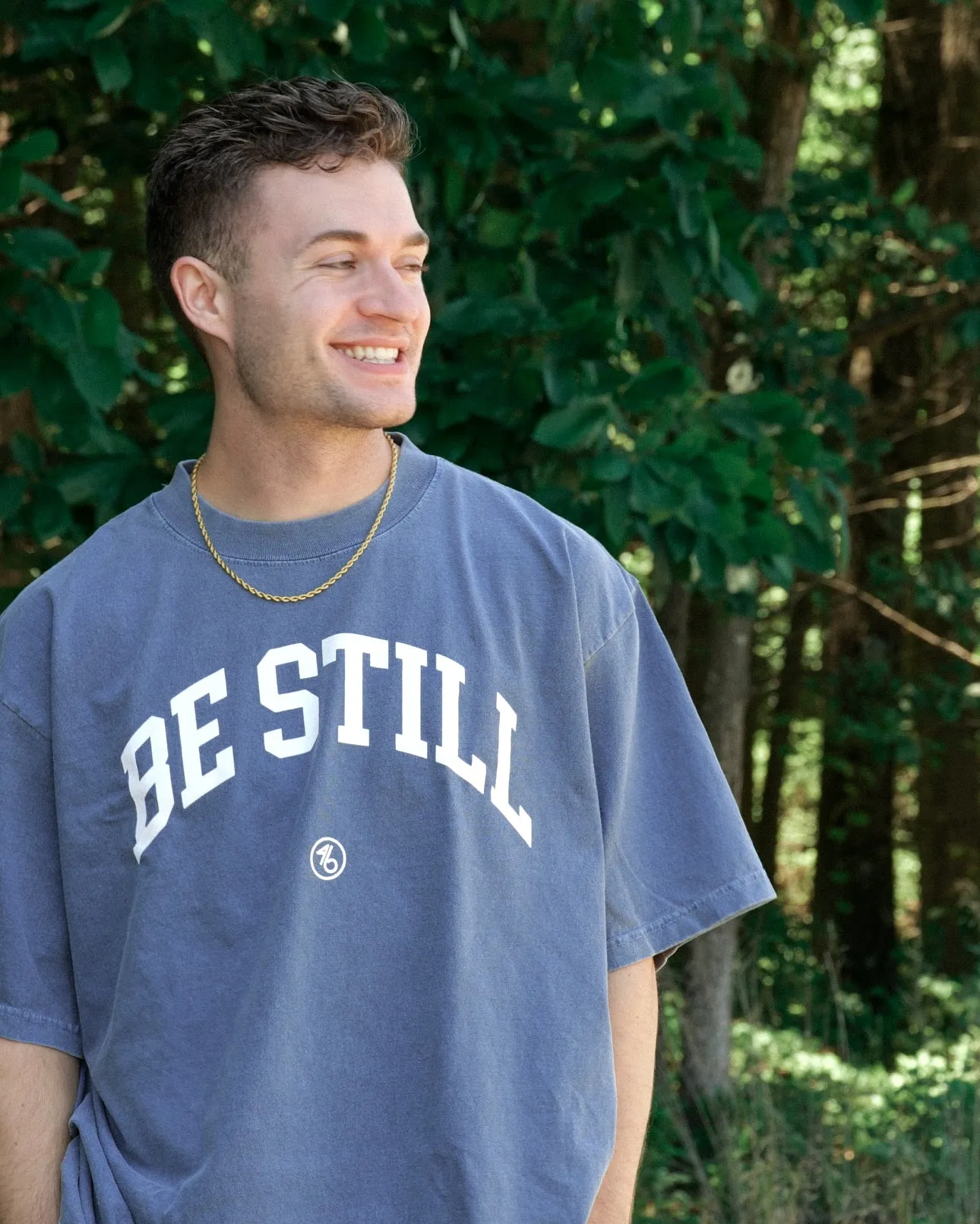 BE STILL University Style Heavy Tee