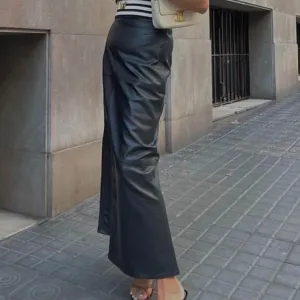 YESMYTOOL  -  Autumn Split PU Leather Skirts 2024 New Fashion Long Slim PU Leather Skirts Women Elegant Hip Black Skirts Women Clothing